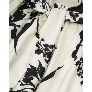Long sleeveless dress in light beige with a contrasting black floral print | | Dika.rs - 2 Long sleeveless dress in light beige with a contrasting black floral print | - 2