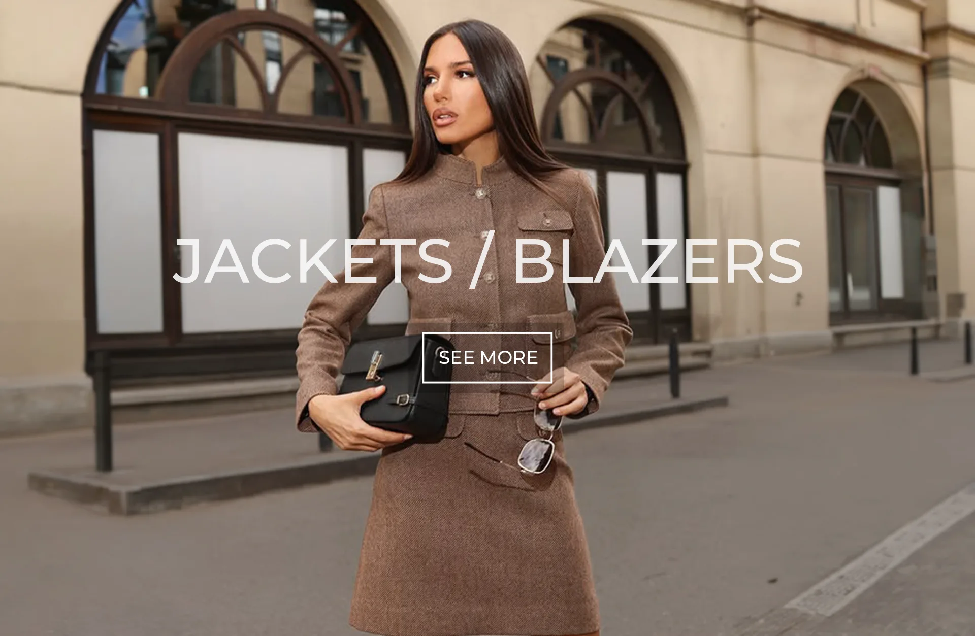 Women’s Blazers and Jackets | DiKa Model wearing a brown DiKa blazer and skirt from the women’s blazers and jackets collection