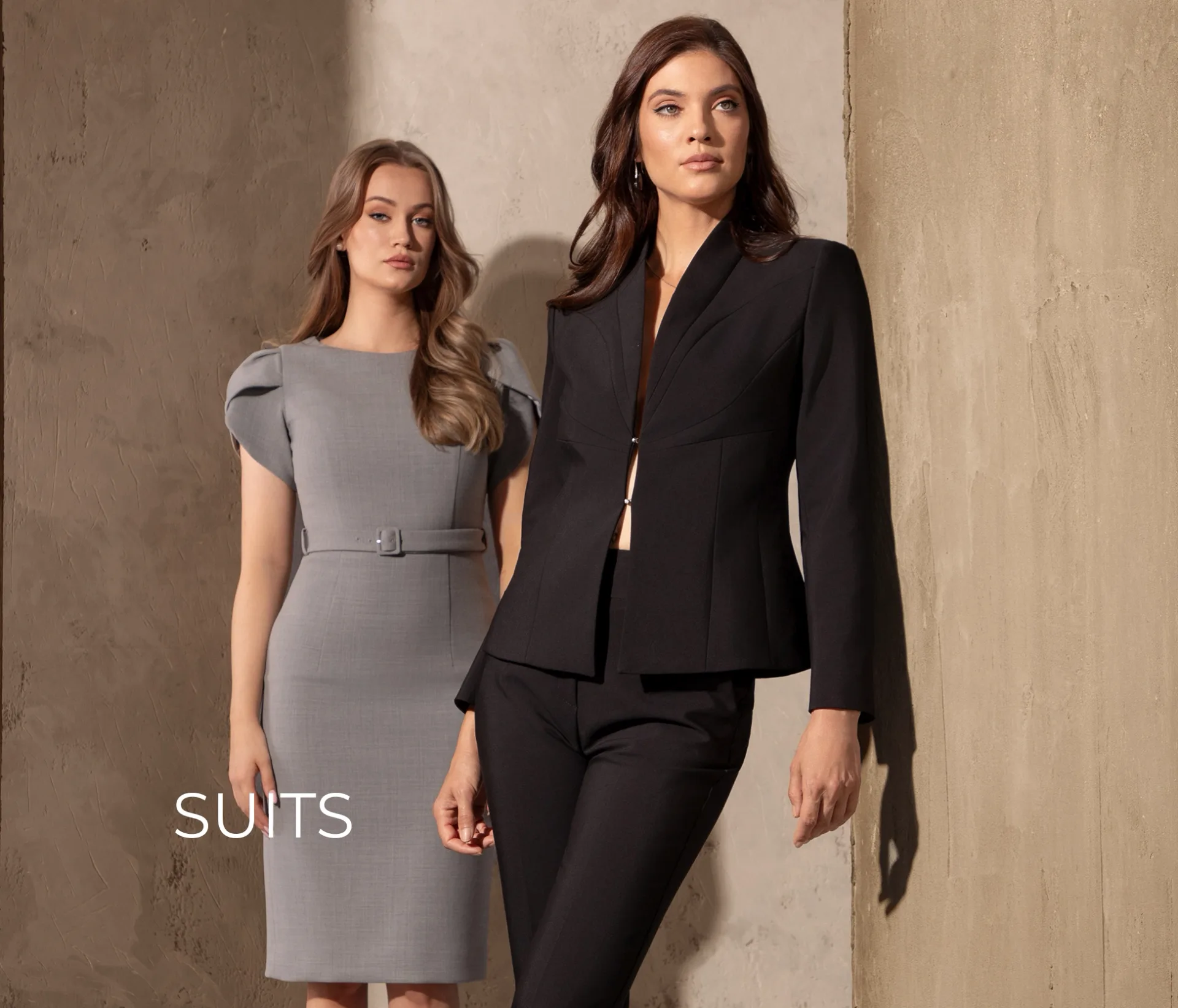 Elegant black women’s suit and grey dress from the DiKa collection