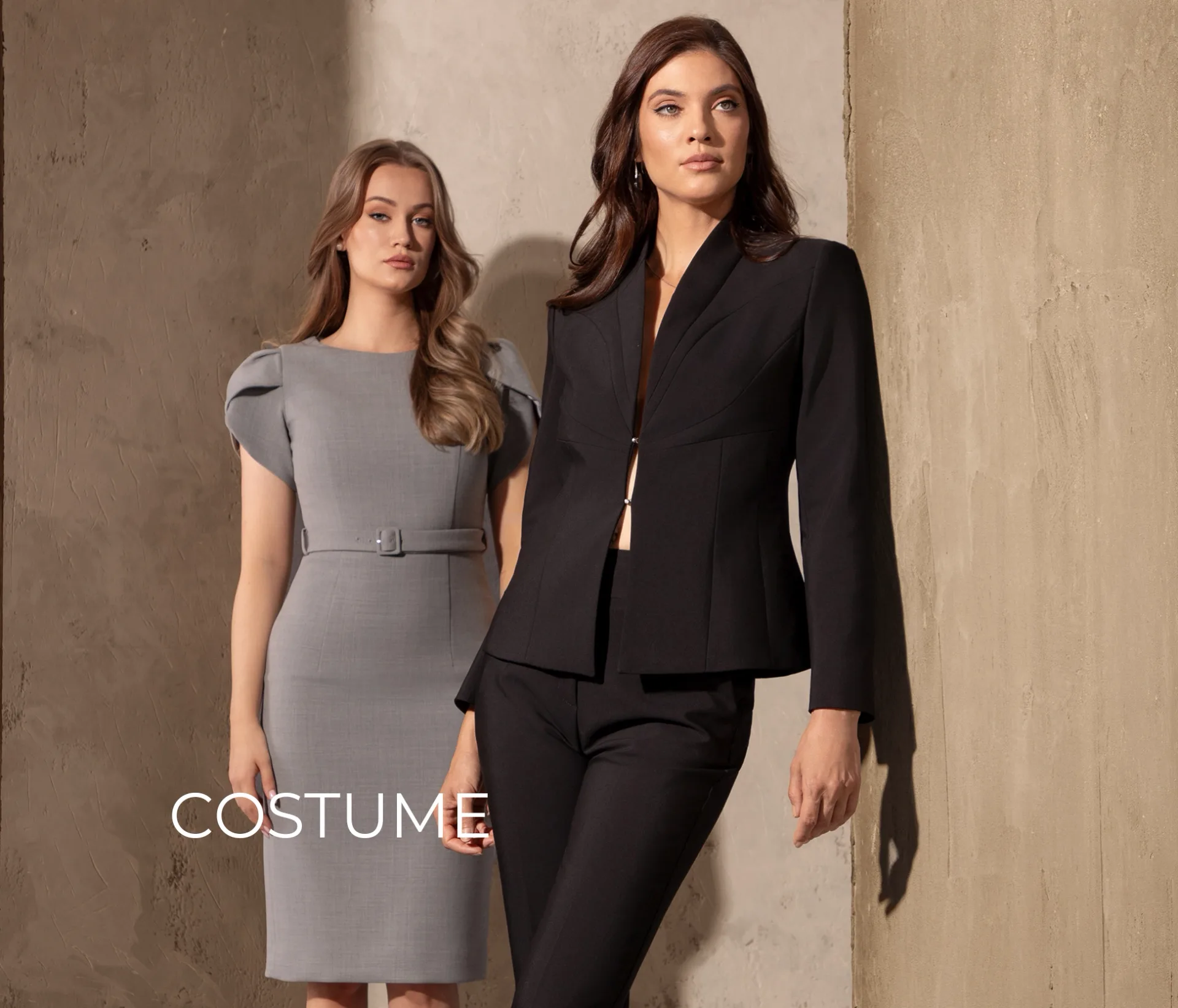 Costume de damă – modele business elegante de la DiKa Costum elegant de damă negru și rochie gri din colecția DiKa