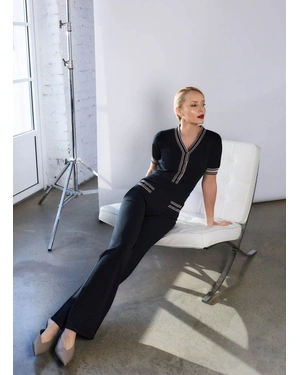 Black knitted jumpsuit with contrasting beige details | Jumpsuites - 1