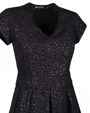 A dress made from textured fabric |  - 2