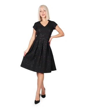 A dress made from textured fabric |  - 3