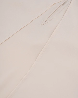 Beige fine blouse with long sleeves and neckline detail | Blouses - 2
