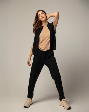 Crne pletene trenerke iz capsule kolekcije ležerne odeće. | Pantalone i Helanke | Dika.rs - 3 Crne pletene trenerke iz capsule kolekcije ležerne odeće. | Pantalone i Helanke - 3