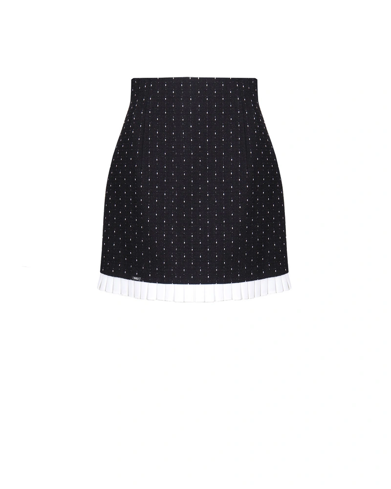 Black short cotton tweed skirt with white pleat detail at the hem | Skirts and Shorts