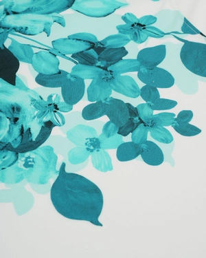 White sleeveless blouse with turquoise floral print | Blouses - 2